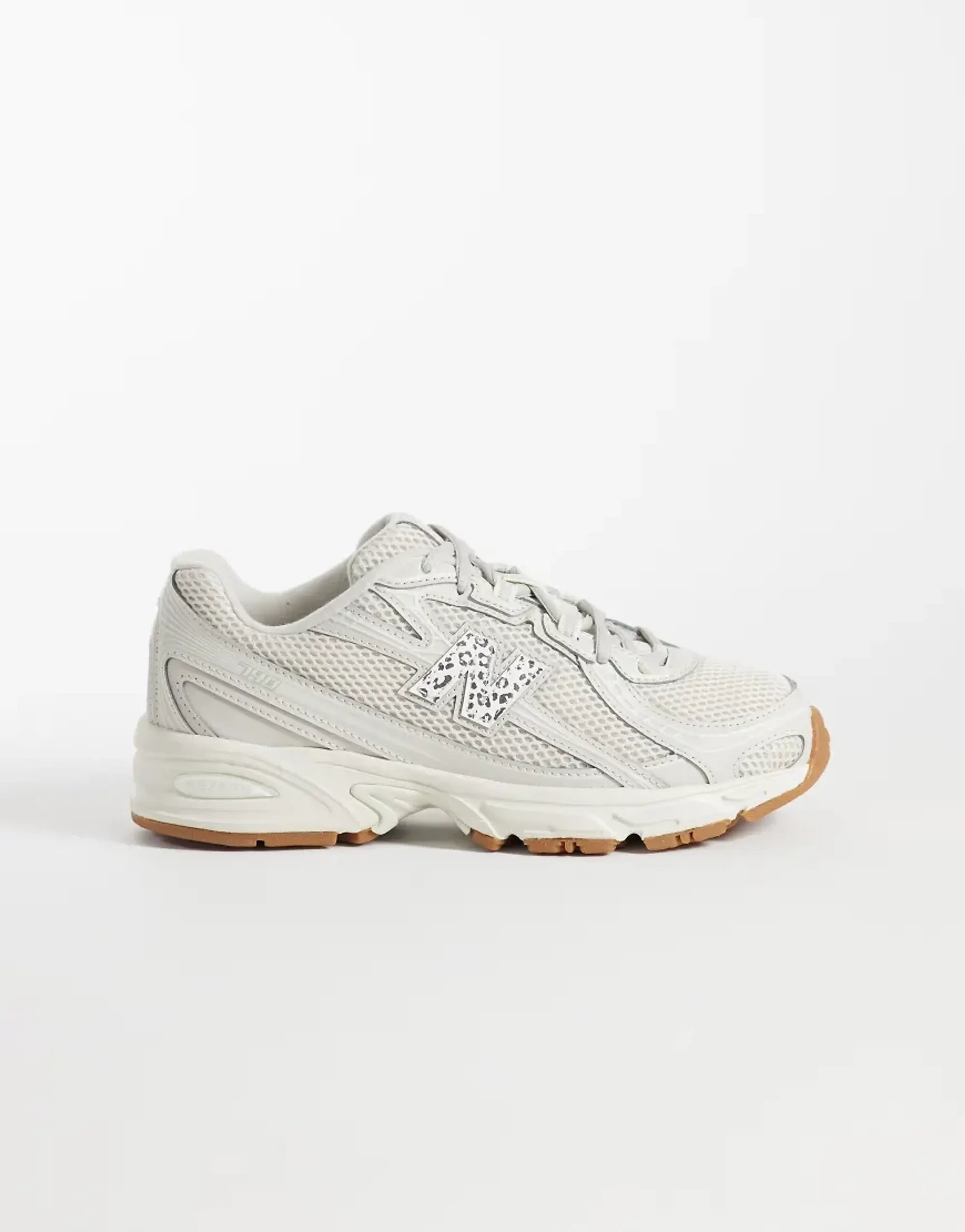 New Balance 740 Trainers In Off White And Leopard Print