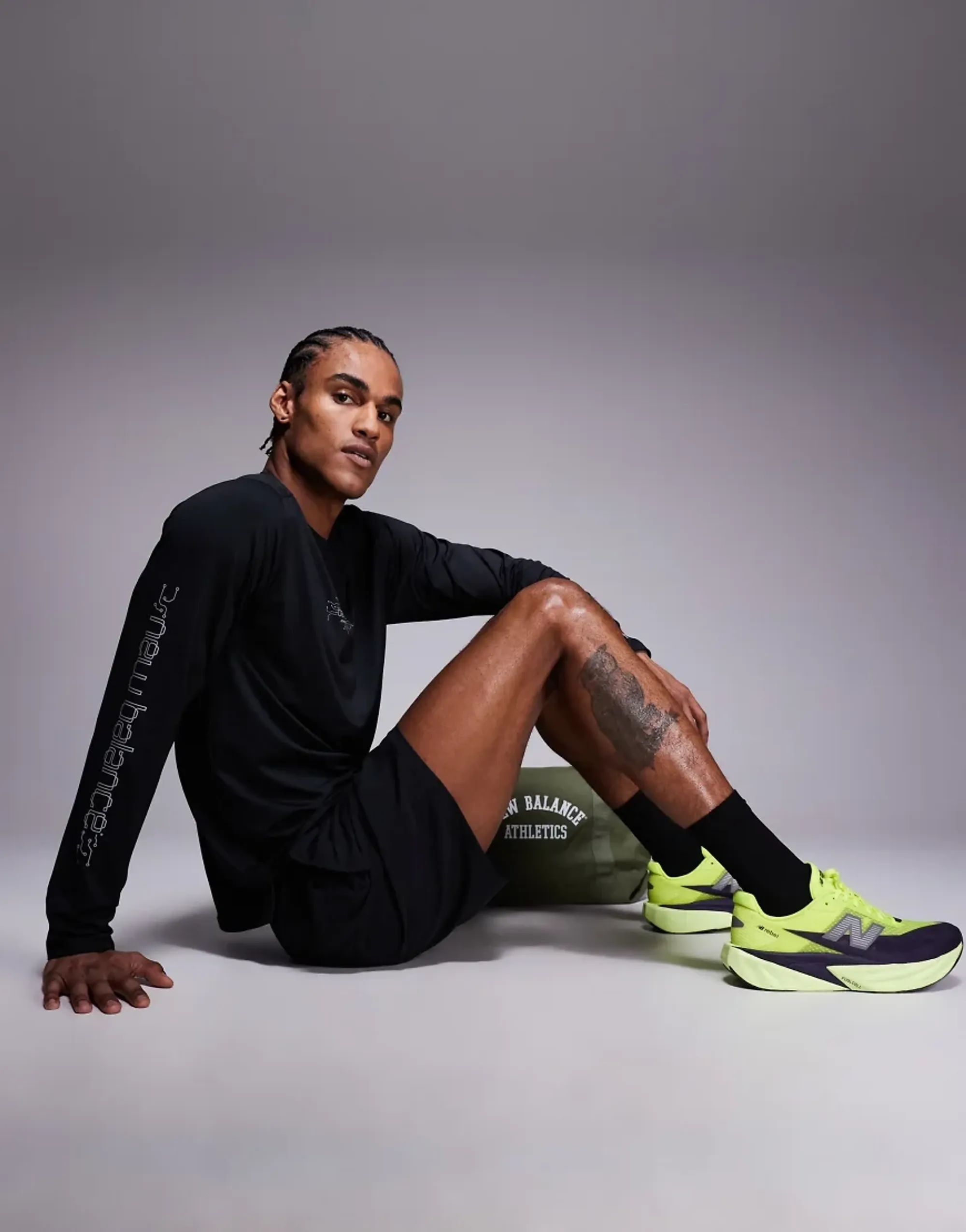 New Balance Men's Reflective Poly Long Sleeve T-Shirt in Black Polyester