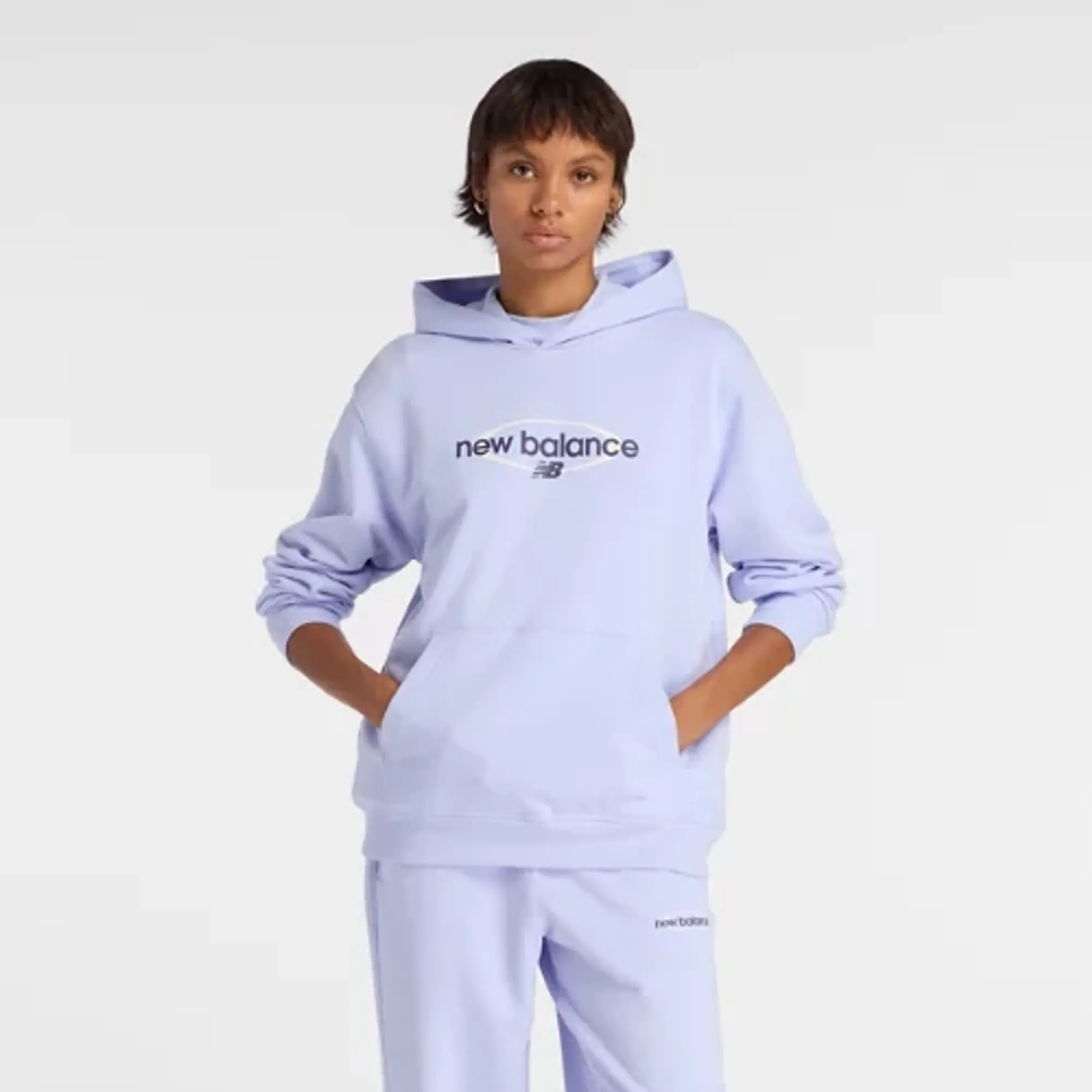 New Balance Women's Sport Graphic Relaxed Hoodie in Purple Cotton Fleece