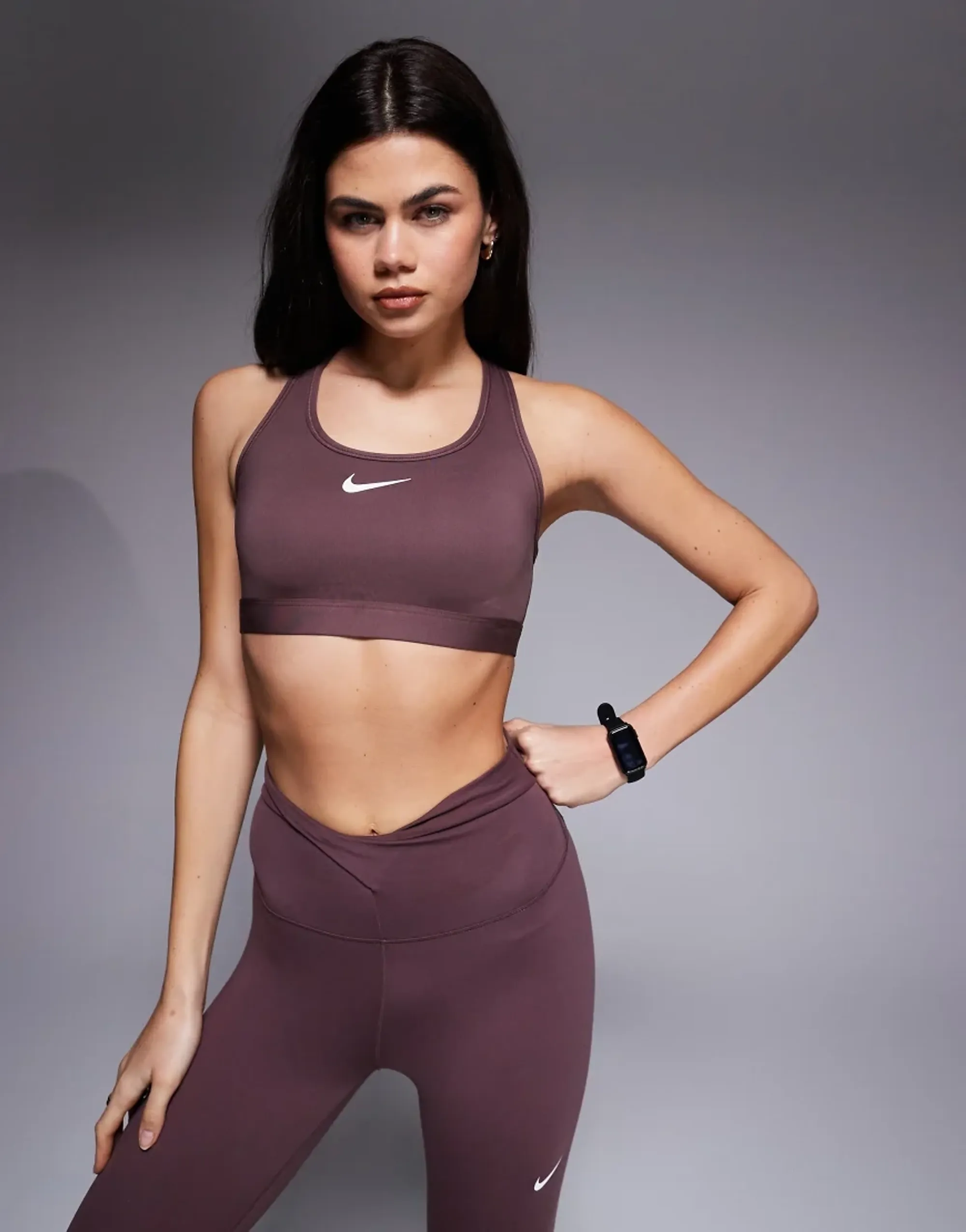 Nike Training Swoosh Medium Support Sports Bra In Dark Purple-Brown
