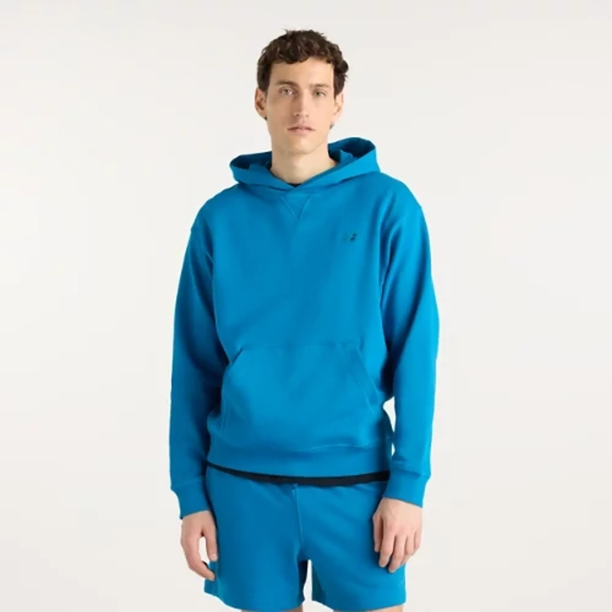 New Balance Men's Athletics French Terry Hoodie in Blue Cotton Fleece