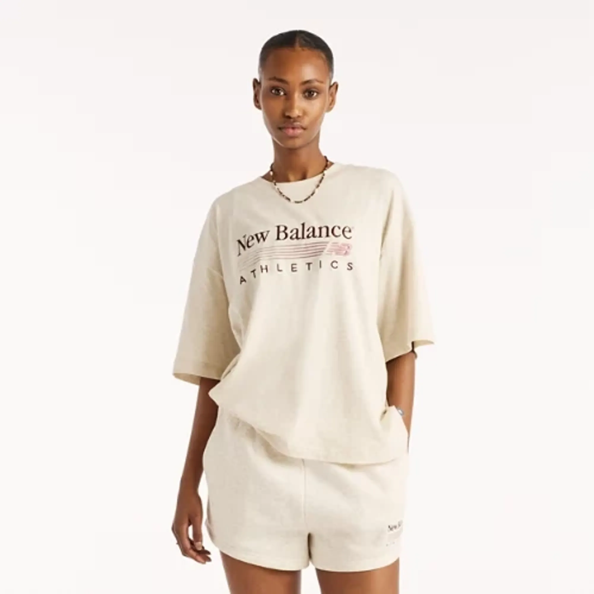 New Balance Women's Trackside Oversized T-Shirt in Beige Cotton Jersey
