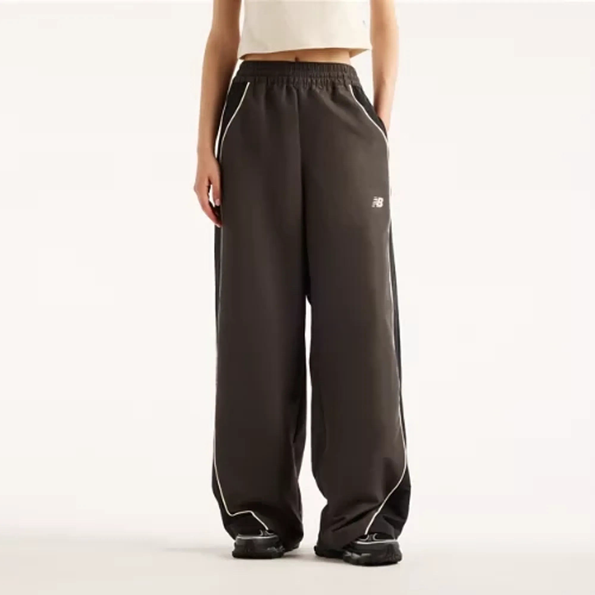 New Balance Women's Trackside Woven Pant in Grey Polywoven